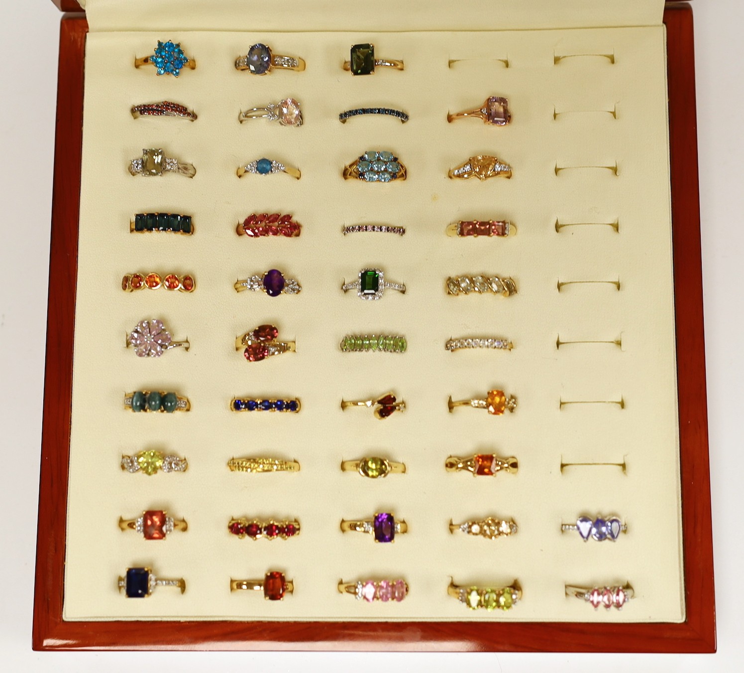 Thirty nine assorted modern 9ct gold and gem set dress rings, including amethyst and garnet and two 18ct gold and gem set rings, in ring box.